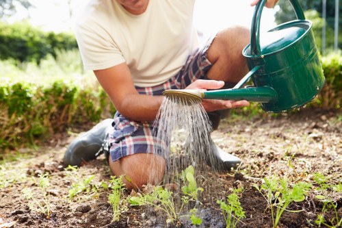 Landscaping team reviewing ethical labour practices